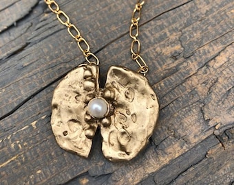 Pendant-Bronze Split Shell with Natural Pearl setting. Wax Carved unique stylized Shell, Petal, Pebble, Sea Urchant.