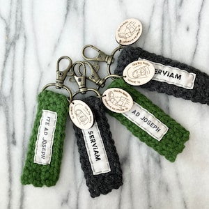 Keychain. Saint keychain with charm. Saint Joseph Keychain. Ite ad Joseph. Go to Joseph. Catholic gifts. Catholic keychain.