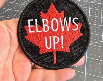 Elbows Up!  Coudes Levés!  Iron-On Patch, Canadian Embroidered Patch