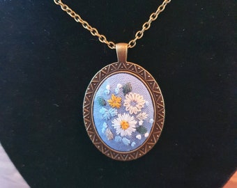 Hand Embroidered Pendant with Chain, Daisies on Blue Cotton Cloth, Set in Antique Bronze Bezel with 37" Matching Chain
