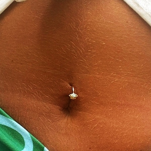 Alien belly ring top