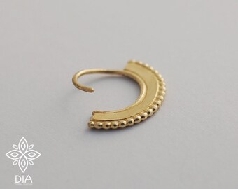 May include: A gold hoop earring with a beaded edge. The earring is half-round and has a smooth, polished finish.