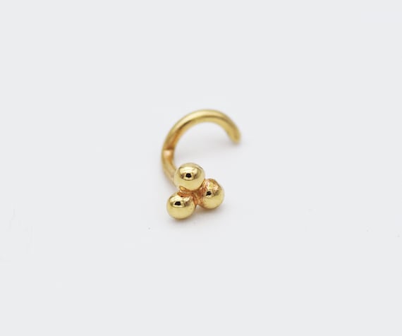 Piercing nez serpent or jaune 18 carats et oxyde de zirconium