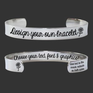 May include: Two silver-colored cuff bracelets. The top bracelet has the text "Design your own bracelet" with a flower graphic. The bottom bracelet says "Choose your text, font & graphics!" with a flower graphic and "Add text to the inside, outside or both sides."