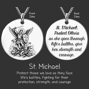 May include: A silver-colored pendant necklace. The front of the pendant features a detailed illustration of St. Michael. The back of the pendant has the text "St. Michael, Protect Olivia as she goes through life's battles, give her strength and courage."