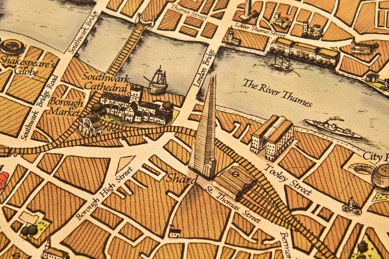 May include: A vintage-style map of London, England, with a focus on the Southwark area. The map features landmarks like Shakespeare's Globe, Southwark Cathedral, and the Shard. The River Thames is also depicted, along with several bridges.