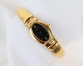 Orologio da polso Citizen vintage nero e oro