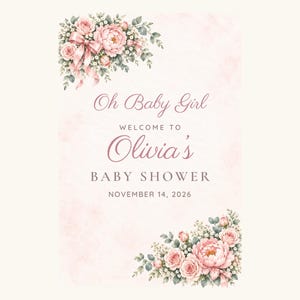 May include: A rectangular sign with a pale pink watercolor background featuring floral arrangements of pink roses and greenery in the top-left and bottom-right corners. The text reads: Oh Baby Girl WELCOME TO Olivia's BABY SHOWER NOVEMBER 14, 2026.