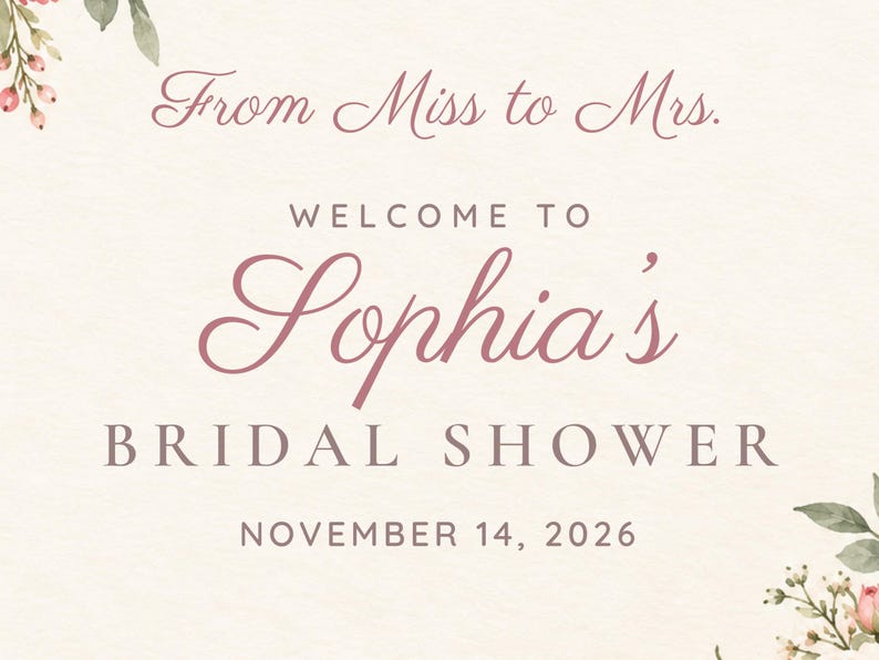 Op de afbeelding: Een cr&egrave;mekleurig bord met de tekst From Miss to Mrs. WELCOME TO Sophia's BRIDAL SHOWER NOVEMBER 14, 2026 in donkerroze en bruine letters, versierd met aquarel bloemenaccenten in de linkerbovenhoek en de rechterbenedenhoek.
