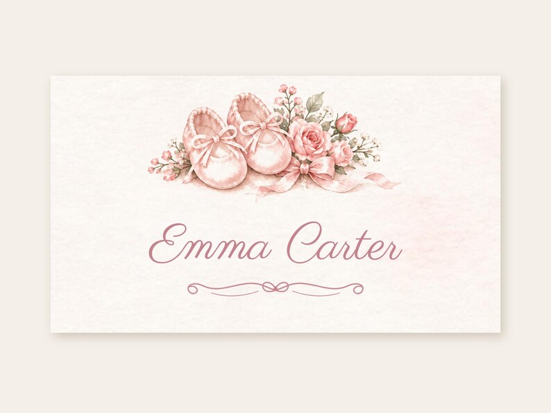 May include: A rectangular card featuring a watercolor illustration of a pair of light pink baby shoes, a bouquet of pink roses, and a ribbon. The text Emma Carter is printed in a dark pink script font below the illustration.