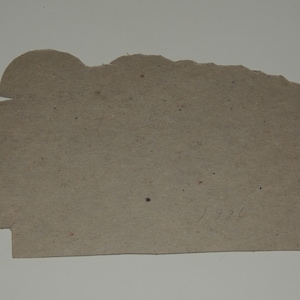 May include: A brown cardboard tag with the number "1936" handwritten on it.