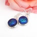 see more listings in the Silver Dangle Earrings section