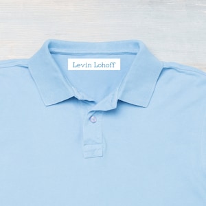 Etichette termoadesive blu personalizzate con nomi per abbigliamento e lavanderia