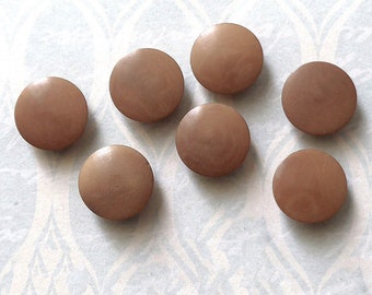 Corozo nut buttons, diminutive, a set of 9, vintage.  Natural tan colour, 2 hole reverse, c1920's-30's.