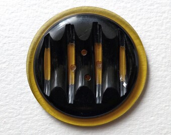 Square with cut diagonal lines with a black bakelite diag vintage 2 hole sew-thru Lucite button top bar apple juice Art Deco c1930/'s