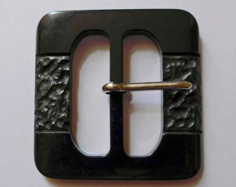 Buckle, ladies, vintage.  Black resin possibly bakelite, square with decorative side sections, metal fastener, c1940's.