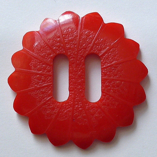 Art Deco buckle, vintage.  A floral based design, circular red pressed rigid plastic, a swish buckle. c1920's-30's.