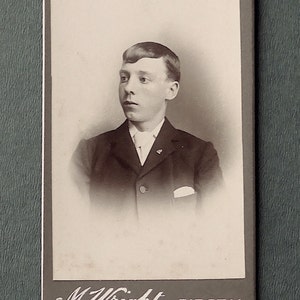 Carte-de-visite, antique.  Featuring a young man wearing a coronation badge for King Edward V11, (1902), M. Wright, Birstal, (Leeds)
