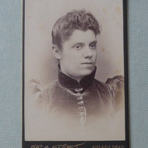 Carte-de-visite, antique.  Featuring a pensive young lady in a velvet dress. Robert T. Watson, Anlaby Street, Hull. c1880's.