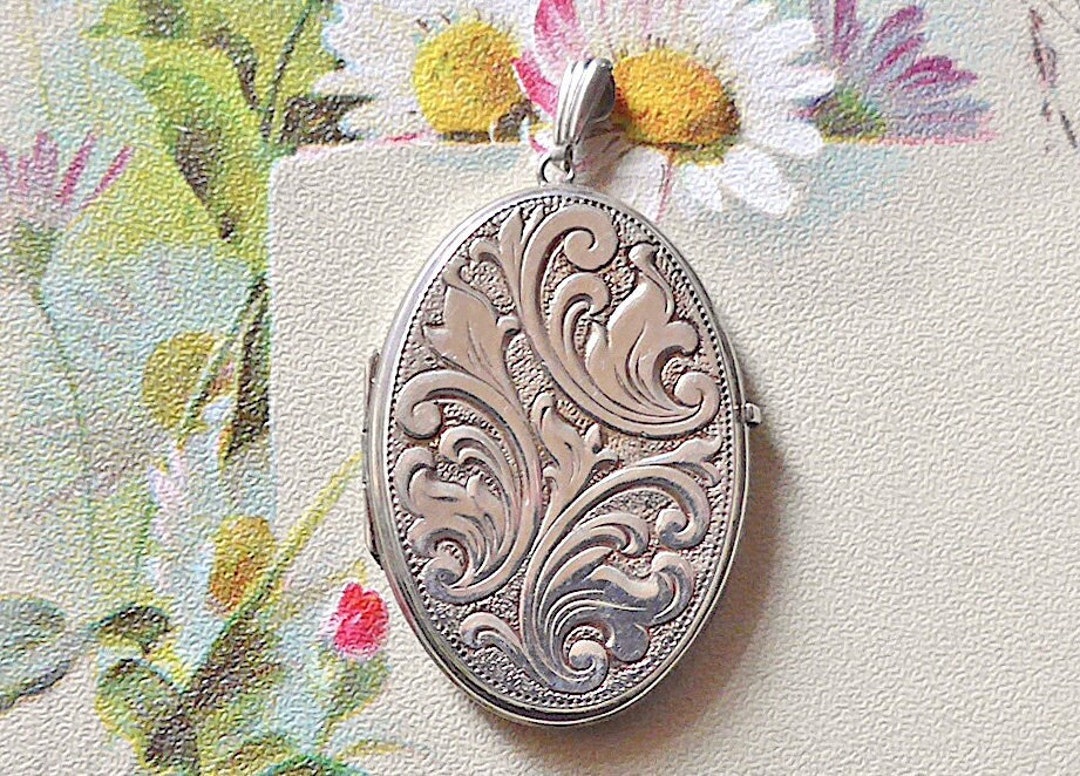 Locket, Silver With a Botanical Design, Vintage. A Pretty Oval Locket ...