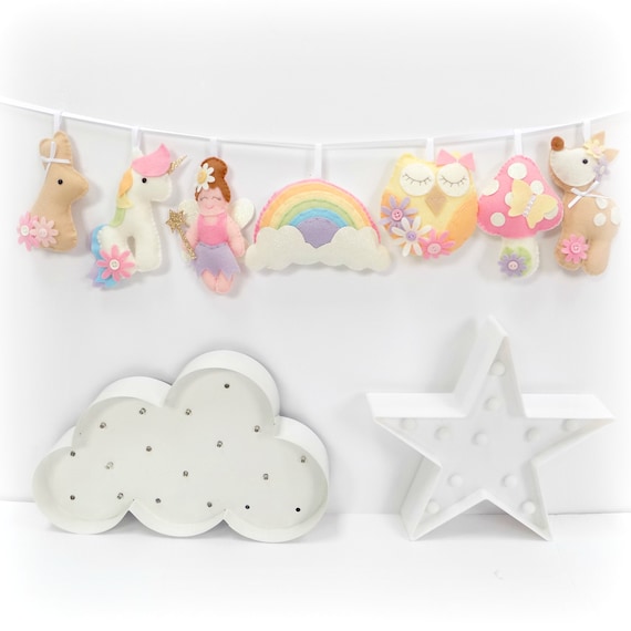 Felt garland craft kit including a fairy, unicorn, bunny, rainbow, owl, toadstool and deer