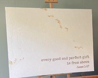 May include: White canvas painting with gold accents and the text "every good and perfect gift is from above James 1:17" on a wooden easel.