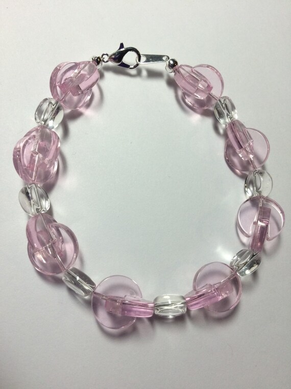 Items similar to Pink and Clear Interlocking Beaded Bracelet. on Etsy