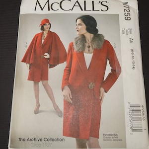 May include: McCall's sewing pattern for a vintage 1920s style coat with a fur collar. The pattern is for sizes 6-8-10-12-14. The pattern is part of the Archive Collection.