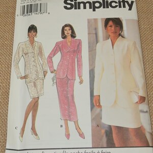 May include: Simplicity sewing pattern featuring illustrations of women's suits in cream, pink, and white. The pattern includes a skirt suit and a pantsuit. The text "easy pocket configuration" is visible.
