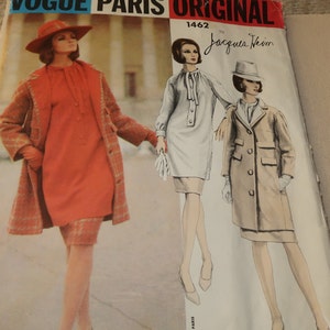 May include: Vintage Vogue Paris Original sewing pattern featuring a woman in a red dress and coat, and illustrations of other designs. The pattern is by Jacques Heim, with the number 1462.