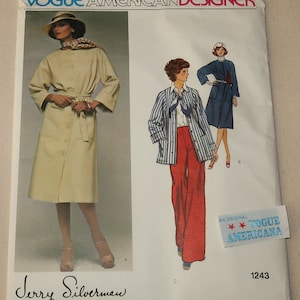 May include: A vintage Vogue American Designer sewing pattern featuring illustrations of women's clothing designs. The pattern includes a long coat, striped jacket, and wide-leg pants. The cover has the text "VOGUE AMERICAN DESIGNER" and "Jerry Silverman."