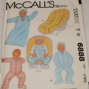May include: A sewing pattern for a baby's clothing set, including a sleeper, a jumpsuit, and a hooded jacket. The pattern is from McCall's and is size 3 months. The pattern number is B 6888.