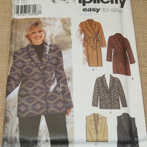 May include: Simplicity sewing pattern featuring various coat and jacket designs. The pattern includes a woman wearing a patterned jacket. The pattern's text includes "easy-to-sew" and size information.