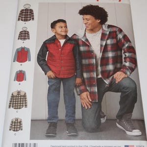 May include: Simplicity sewing pattern 8475 featuring instructions for hooded flannel shirts and button-down shirts with yokes. The envelope displays illustrations of three shirt variations labeled A, B, and C, along with a photograph of two people wearing the garments.