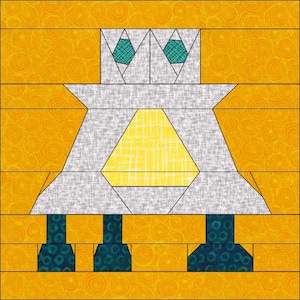 May include: A gray and white patchwork quilt block with a yellow diamond in the center. The block has a whimsical design resembling a creature with three legs and a head with two eyes. The eyes are teal blue and the legs are teal blue with white circles.