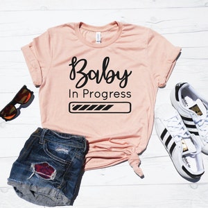 Baby In Progress Shirt - Maternity T-Shirt - Pregnancy Tee Shirt - Mom to Be - Pregnancy Christmas Shirt - Pregnancy Reveal Shirt Loading