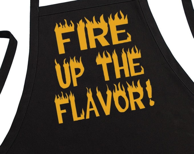 CoolAprons Black BBQ Apron Fire Up The Flavor, Two Pockets, Fully Adjustable, Extra Long Ties, One Size Fits All