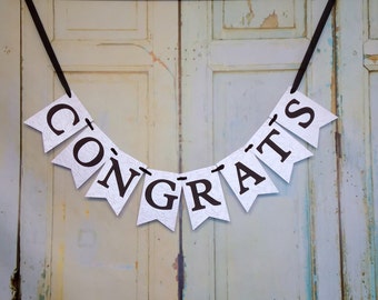 Embossed Congrats Graduation Banner: Black & White Party Sign