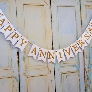 Embossed Anniversary Banner: Cream & Gold Party Decoration