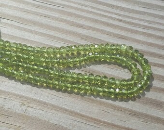 1 15" Natural Peridot Faceted 5mm x 3-4mm Rondelles (119 Beads)