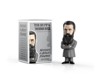 May include: A gray figurine of Theodor Herzl, a historical figure, with a black beard and mustache. The figurine is 8 cm tall and is part of the Nation's Great Figures collection. The box features the text "Theodor Herzl" in Hebrew and English, along with the collection name and the year 1909.