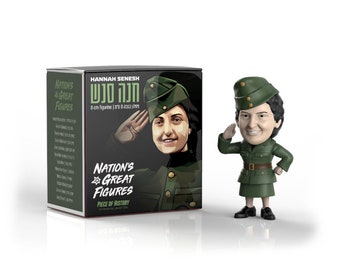 May include: A green and black box with a picture of a woman in a military uniform. The box says "Nation's Great Figures" and "Hannah Senesh". The woman is saluting. There is a small figurine of the woman in the same pose.