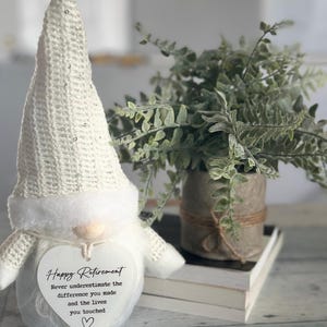 Retirement gnome gift.  THIS LISTING IS FOR ONE WHITE GNOME AND ACRYLIC HEART (happy retirement, never underestimate the difference you made and the lives you touched) ONLY.  Gnome is approximately 11” tall and 4 “ wide  This gnome is not a toy.