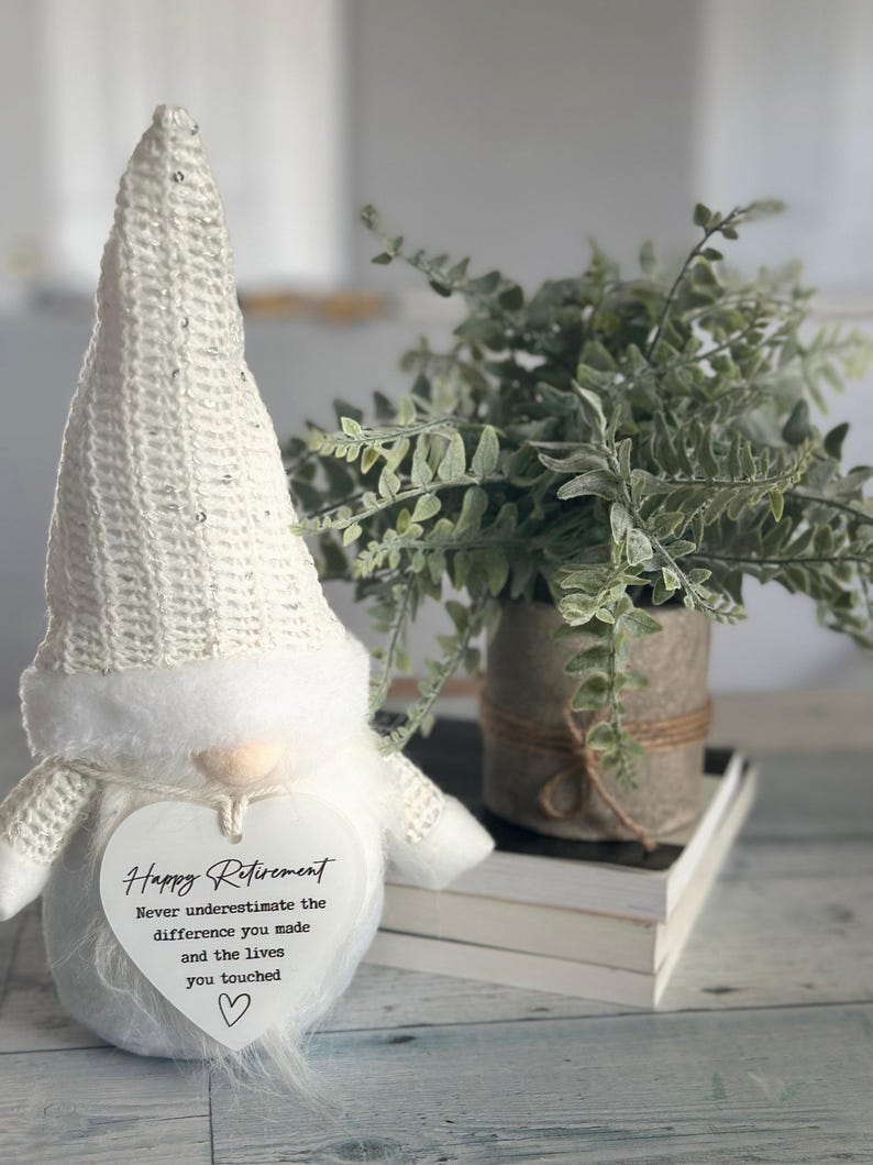 Retirement gnome gift.  THIS LISTING IS FOR ONE WHITE GNOME AND ACRYLIC HEART (happy retirement, never underestimate the difference you made and the lives you touched) ONLY.  Gnome is approximately 11” tall and 4 “ wide  This gnome is not a toy.