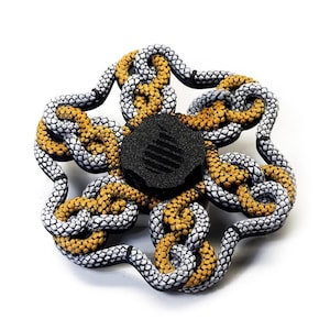 Spinner animado multicolor 3D estilo Auryn con forma de serpiente (Lea la descripción antes de comprar para ver las instrucciones de uso)