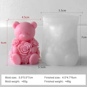 May include: A pink teddy bear-shaped mold with rose detailing, next to a cylindrical mold. The mold size is 5.5 x 5.5 x 7 cm, and the finished size is 4.5 x 4.7 x 6 cm. The mold weighs approximately 65g, and the finished product weighs approximately 49g.