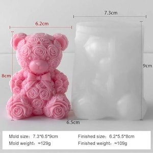 May include: A pink bear-shaped mold and a finished pink bear candle. The mold measures 7.3cm x 6.5cm x 9cm. The finished candle is 6.2cm x 5.5cm x 8cm. The mold weighs approximately 129g, and the finished candle weighs approximately 109g.