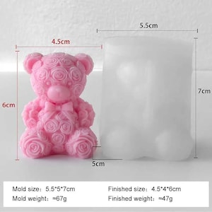 May include: A pink teddy bear mold covered in roses and a rectangular mold. The teddy bear mold is 4.5 cm wide, 6 cm tall, and 5 cm deep. The rectangular mold is 5.5 cm wide and 7 cm tall. The finished bear weighs approximately 47g.