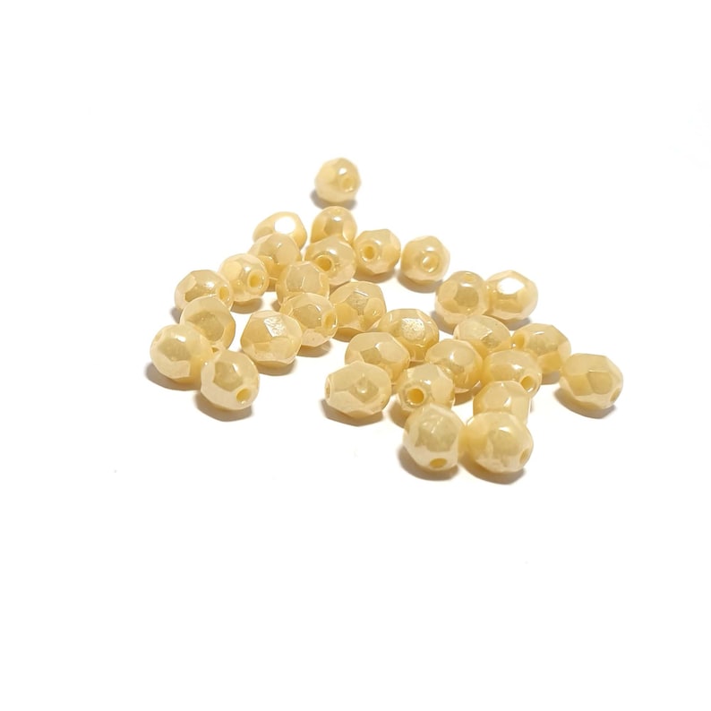 Oval, x30 beads Pretty Cream Czech Glass 4x5mm Oval Faceted Beads