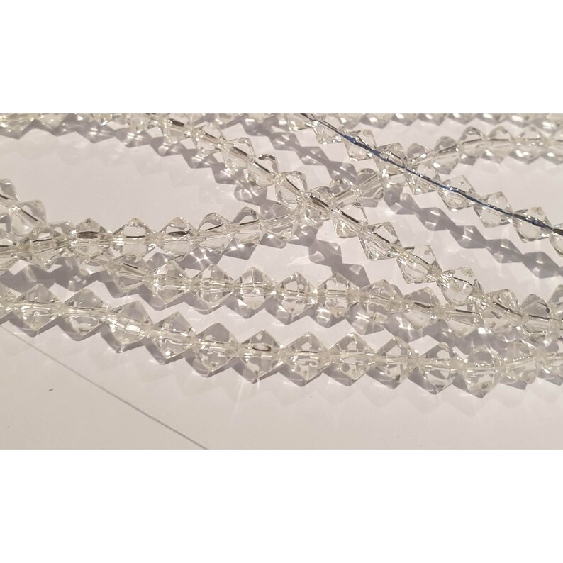 centre drill Wholesale 17x Strands x17 Strands 6mm Clear Bicone Glass Beads x57 beads pstrand bicone glass beads
